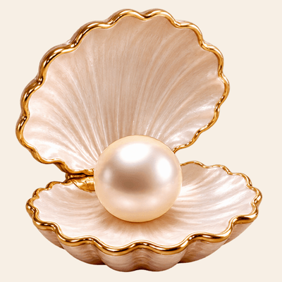 A luminous pearl resting inside an open shell, representing the beginning of PEARLS